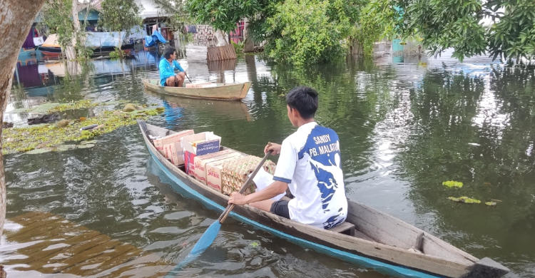 Menembus Banjir Rumah BUMN Pertamina Banjarmasin Hadirkan Harapan bagi Warga Kalsel